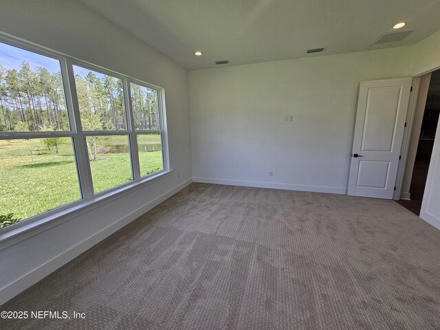 101 Erlking Ct, Saint Johns, FL 32259 - spare room with light carpet and recessed lighting