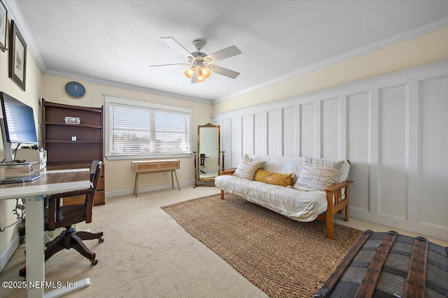 office area with light carpet, ornamental molding, and ceiling fan