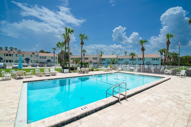 view of pool featuring a patio area