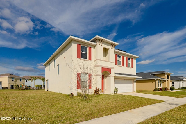 view of front facade featuring a garage and a front lawn