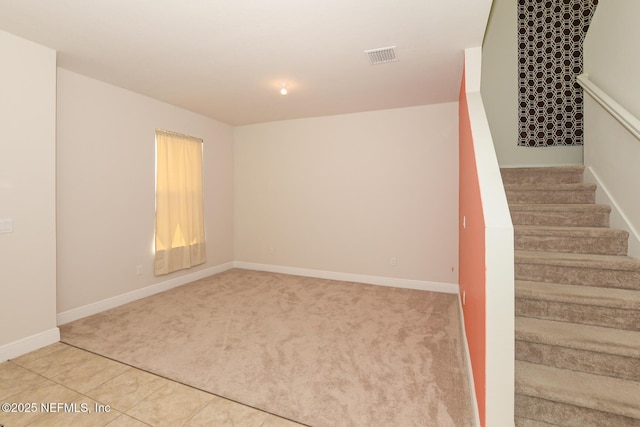 stairs with carpet floors