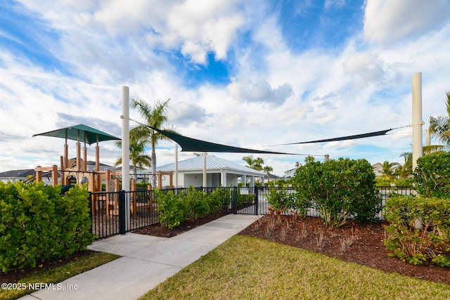 view of home's community featuring a playground