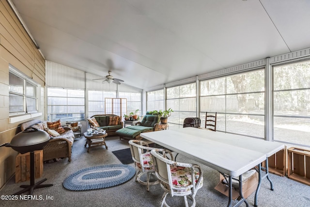 sunroom / solarium with vaulted ceiling and ceiling fan