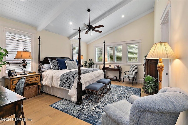 bedroom featuring vaulted ceiling with beams, ceiling fan, and light wood-type flooring