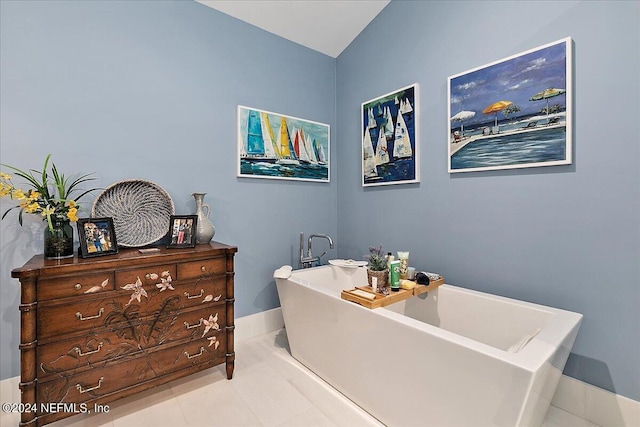 bathroom featuring a bathing tub and tile patterned floors