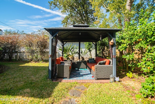 view of yard featuring a gazebo and an outdoor hangout area