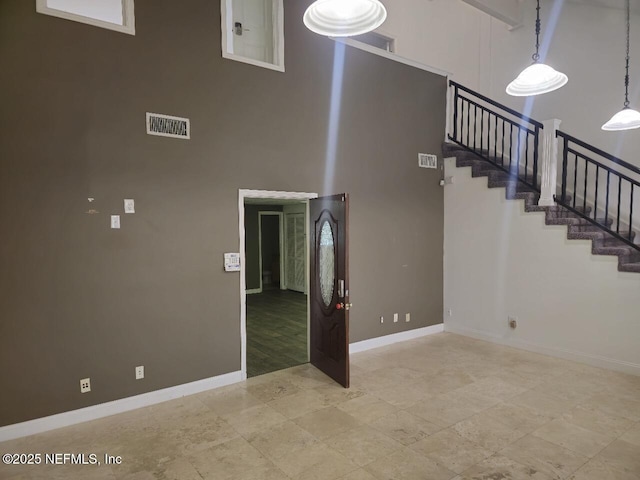 interior space featuring a high ceiling