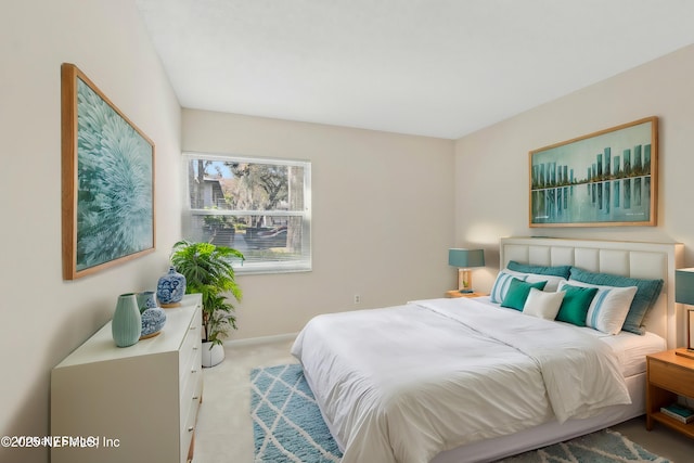 bedroom with light carpet