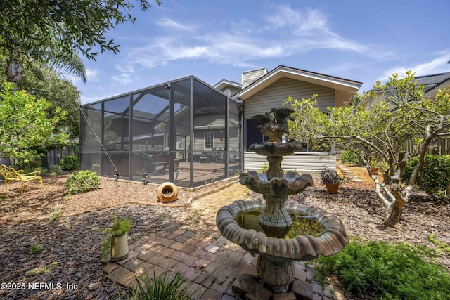 rear view of house featuring a patio