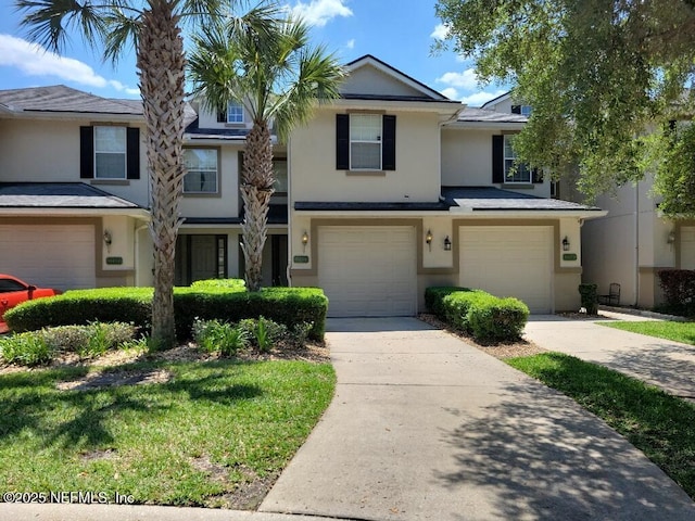 view of property featuring a garage