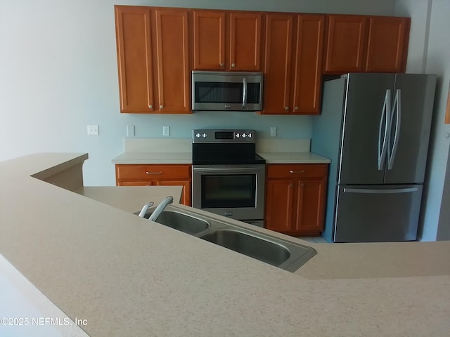 kitchen with sink and stainless steel appliances