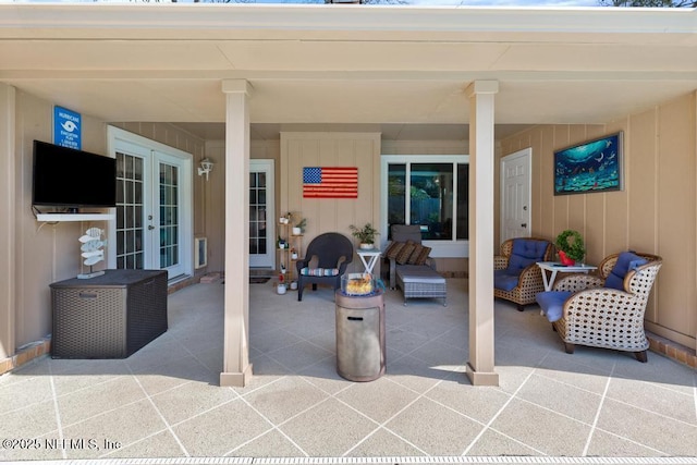 view of patio featuring french doors and outdoor lounge area