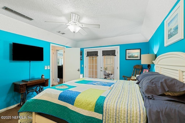 carpeted bedroom featuring ceiling fan, access to outside, french doors, and a textured ceiling