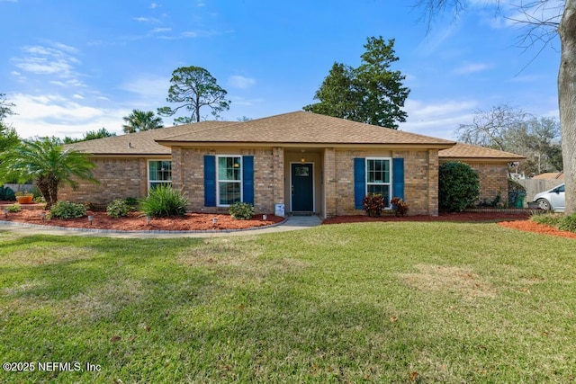 ranch-style house featuring a front yard