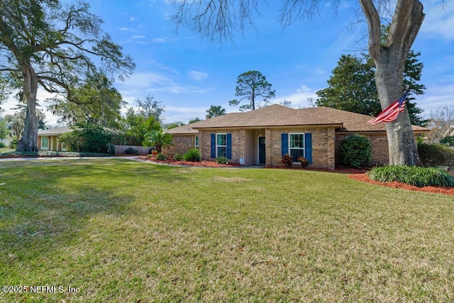 ranch-style home with a front yard