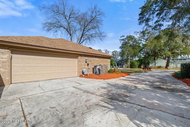 view of property exterior featuring a garage