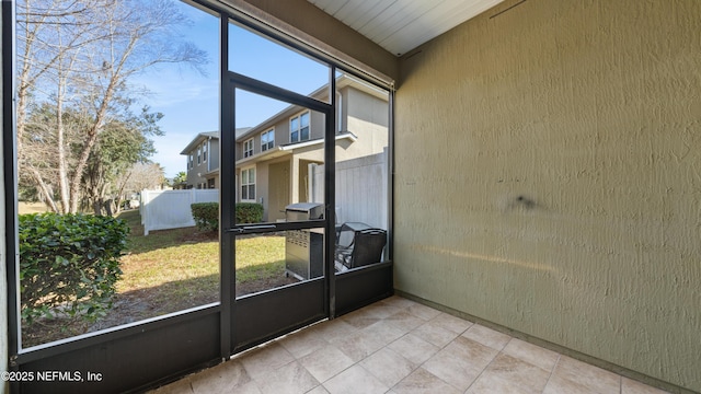 view of unfurnished sunroom