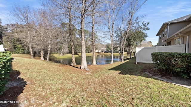 view of yard with a water view