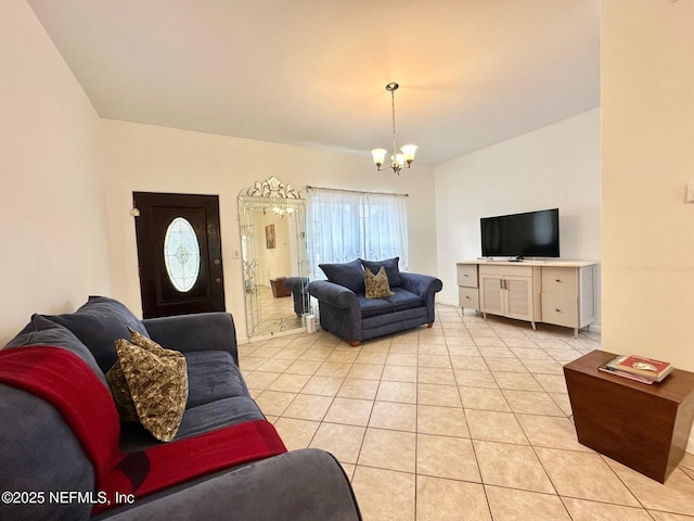 tiled living room with an inviting chandelier