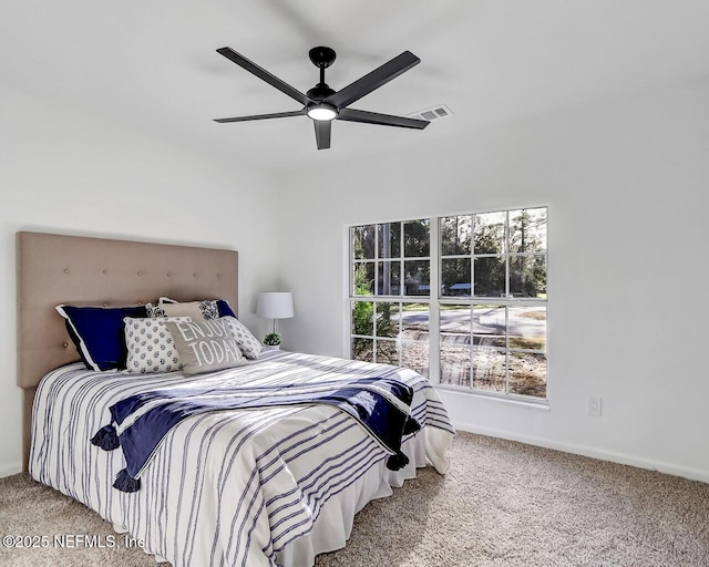 carpeted bedroom featuring ceiling fan