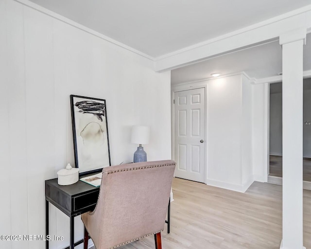 office with light wood-type flooring