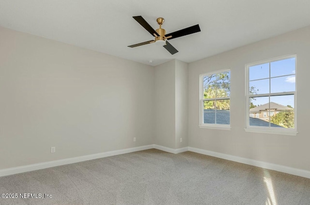 spare room with ceiling fan