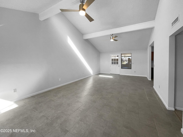 unfurnished living room with ceiling fan and vaulted ceiling with beams