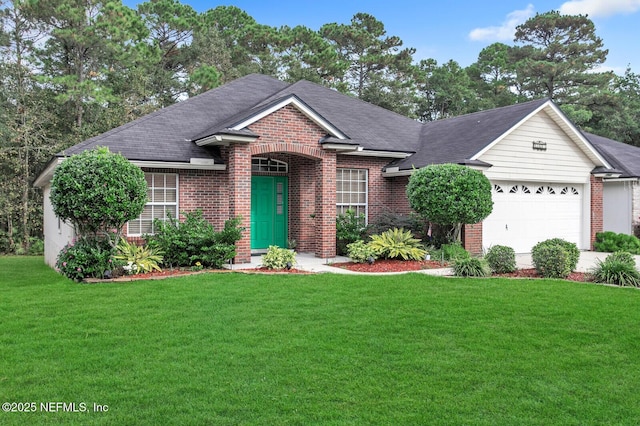 single story home featuring a garage and a front lawn