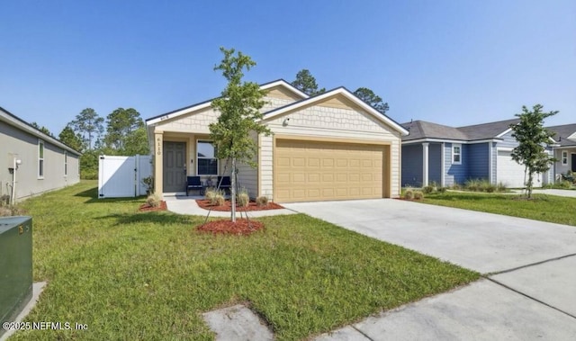 view of front facade featuring driveway, a front lawn, and an attached garage