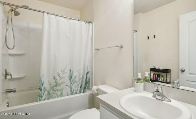 bathroom with vanity, toilet, and shower / bath combo with shower curtain