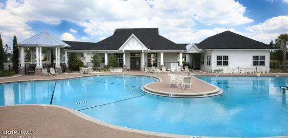 community pool with a patio