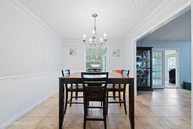 dining room featuring crown molding, a chandelier, and a wealth of natural light