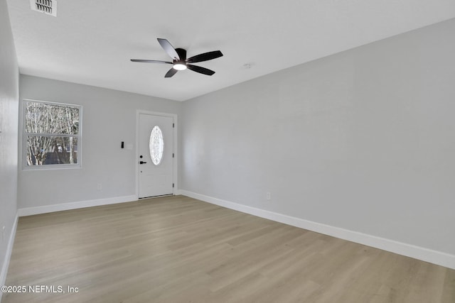 foyer featuring ceiling fan and light hardwood / wood-style floors