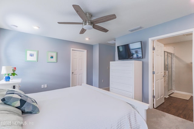 bedroom with dark wood-type flooring and ceiling fan