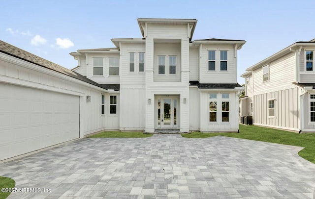 view of front of property with a garage