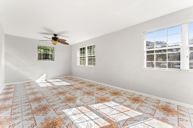 unfurnished room with ceiling fan and light tile patterned floors