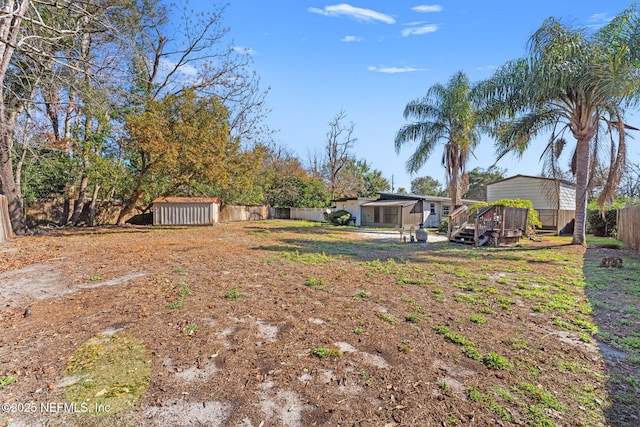 view of yard featuring a deck