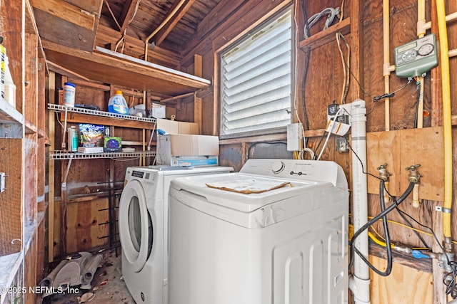 laundry area with washing machine and dryer