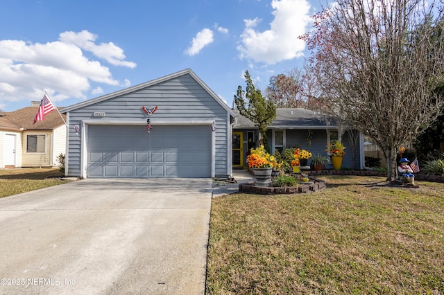 ranch-style home with a garage and a front lawn