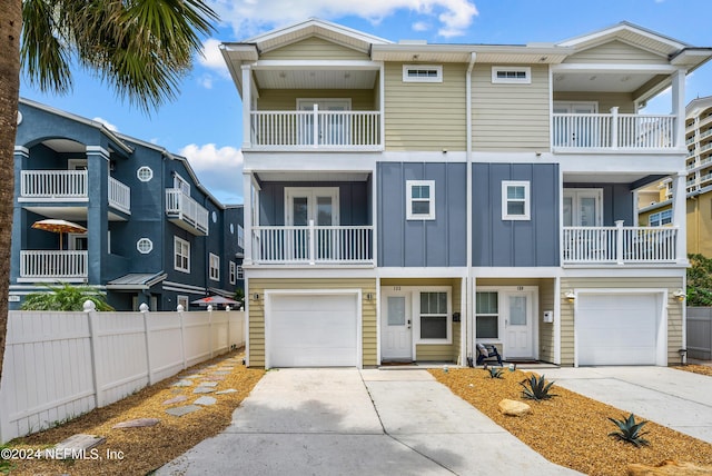 townhome / multi-family property featuring a garage