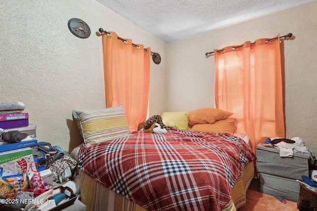 bedroom with a textured ceiling