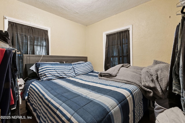 bedroom featuring a textured ceiling