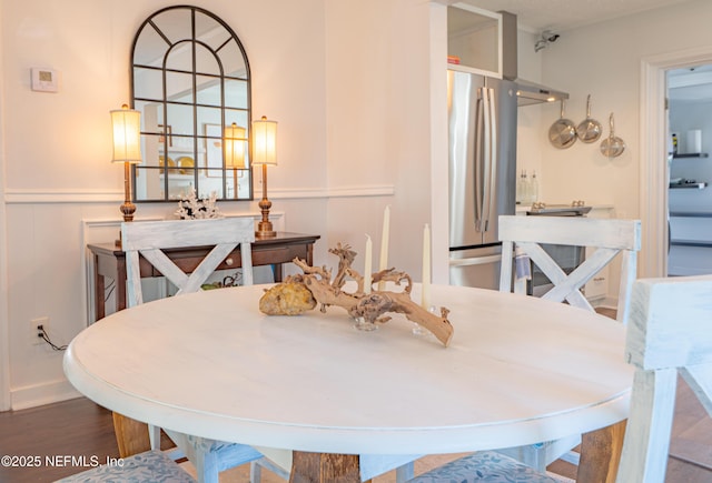 dining room featuring hardwood / wood-style flooring