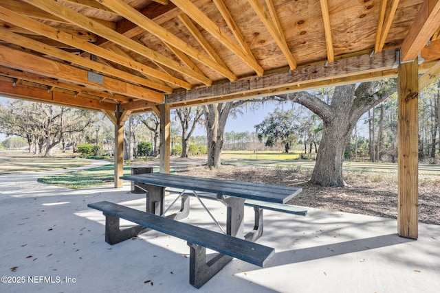 view of property's community with a patio area