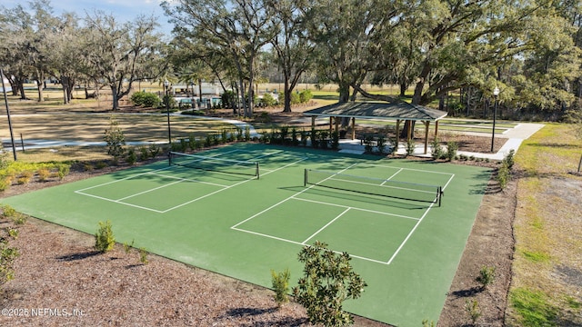 view of sport court with a gazebo