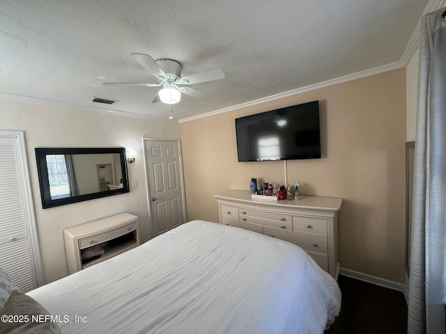 bedroom featuring ceiling fan and ornamental molding