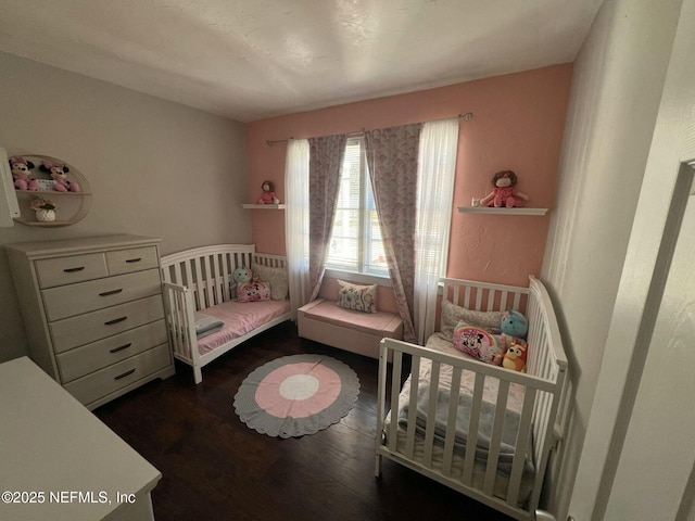 bedroom featuring dark wood-type flooring