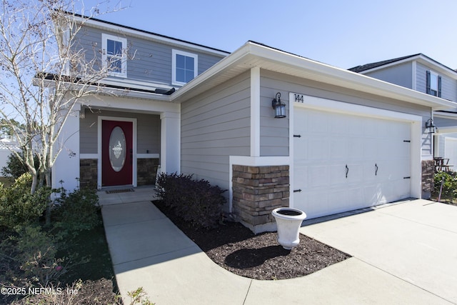 view of front of home featuring a garage