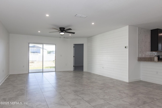 spare room featuring ceiling fan