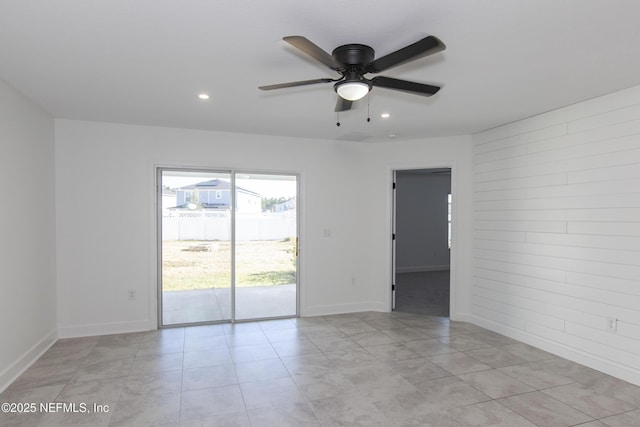 unfurnished room featuring ceiling fan